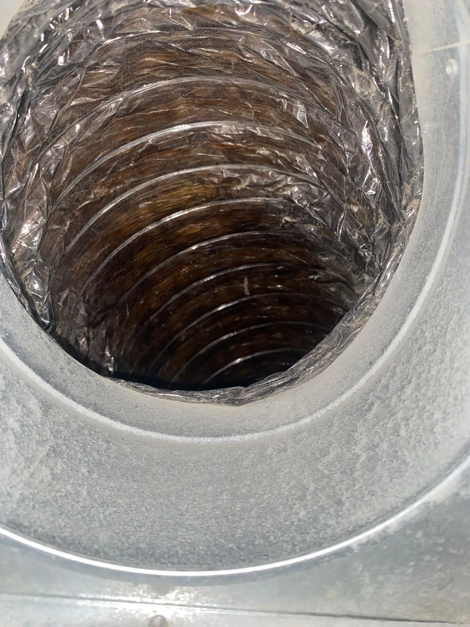 Clean air duct interior after UV light installation and professional cleaning