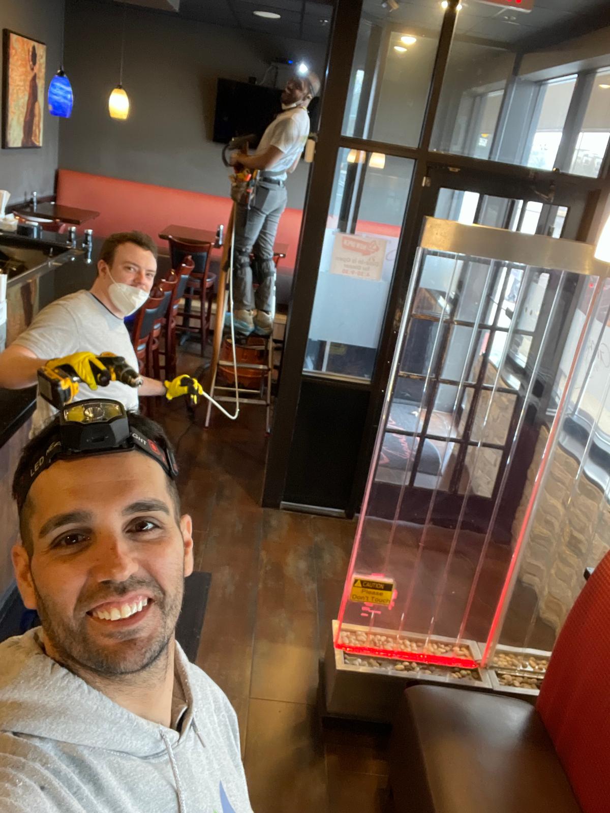 Commercial duct cleaning team at work